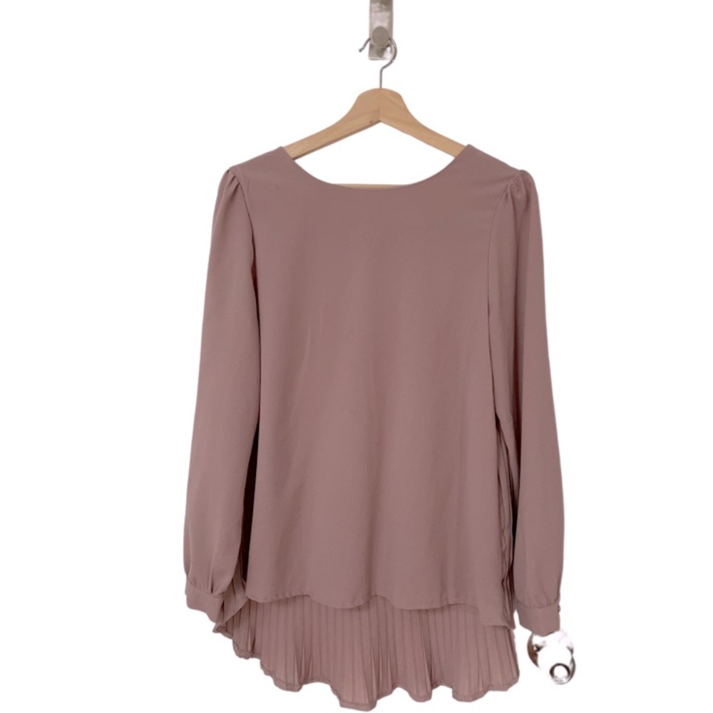 Soft pink blouse with pleated back